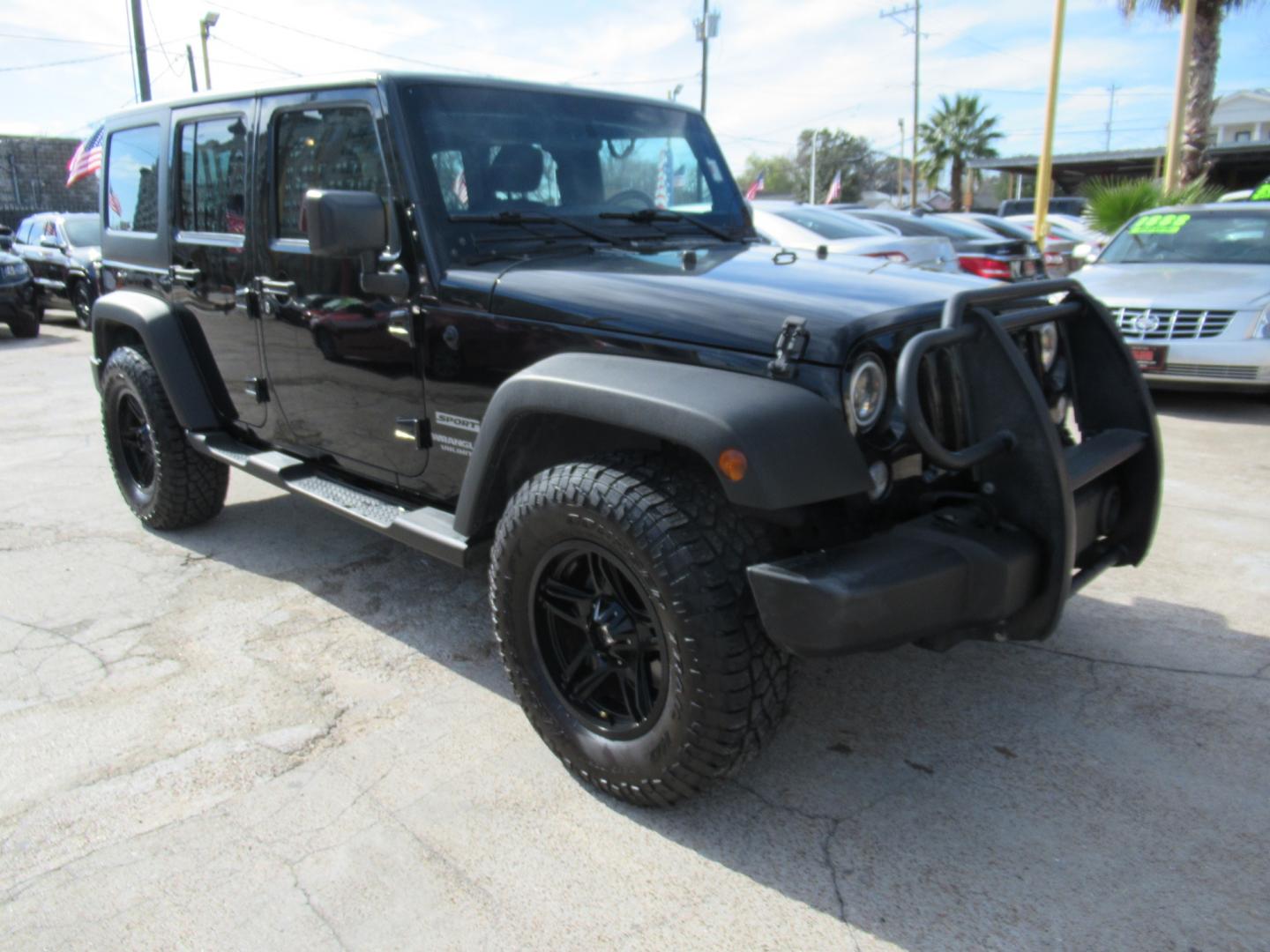 2017 Black /Black Jeep Wrangler UNLIMITED SPORT (1C4BJWDG1HL) with an 3.6L V6 F DOHC 24V engine, Automatic transmission, located at 1511 North Shepherd Dr., Houston, TX, 77008, (281) 657-1221, 29.798361, -95.412560 - 2017 JEEP WRANGLER UNLIMITED SPORT VIN: 1C4BJWDG1HL517754 1 C 4 B J W D G 1 H L 5 1 7 7 5 4 4 DOOR WAGON/SPORT UTILITY 3.6L V6 F DOHC 24V GASOLINE REAR WHEEL DRIVE W/ 4X4 - Photo#18